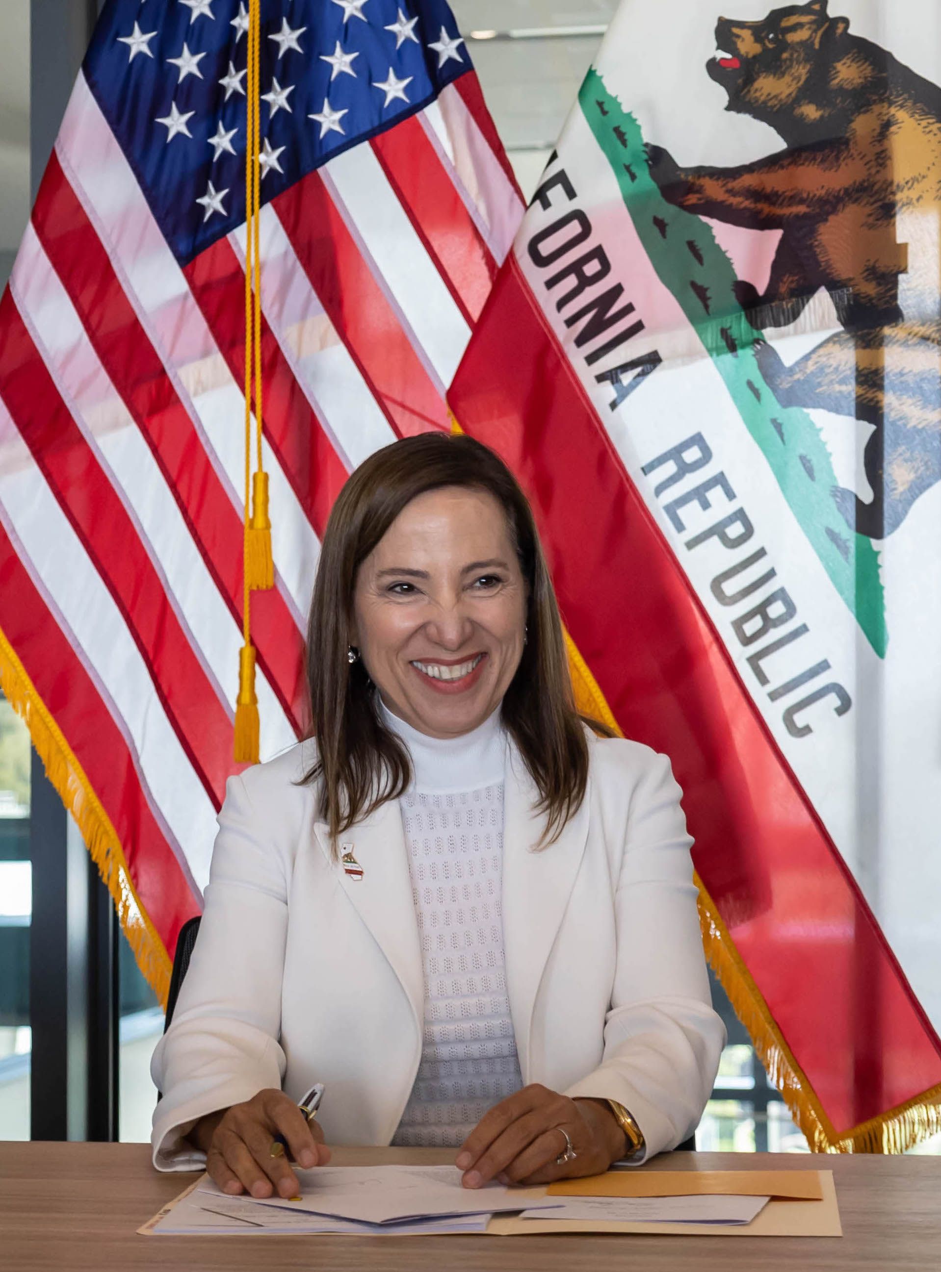 Headshot of Eleni Kounalakis